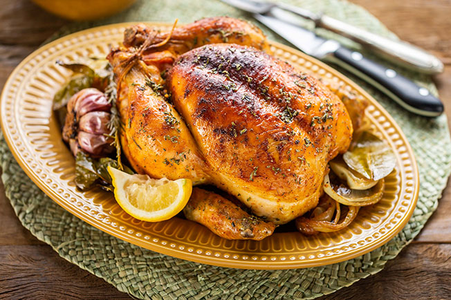 Frango assado com limão siciliano e ervas